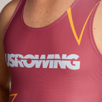 Close-up of a person wearing a maroon unisuit with a large white USROWING logo across the chest and yellow graphic accents.