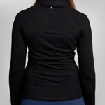 A black long-sleeve athletic top shown from the back on a model, featuring a high collar and subtle seam detailing.