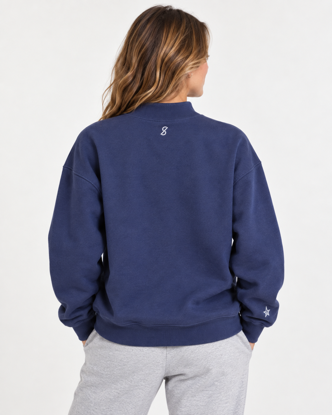 Back view of USALacrosse Mockneck Sweatshirt in blue on a model
