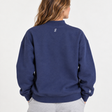Back view of USALacrosse Mockneck Sweatshirt in blue on a model