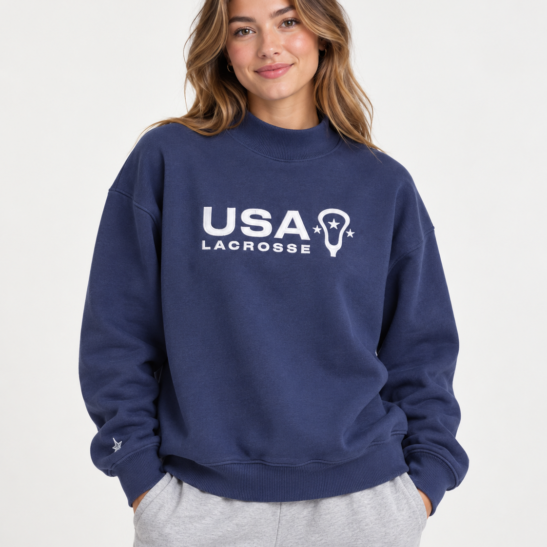 Front view of USALacrosse Mockneck Sweatshirt in blue on a model