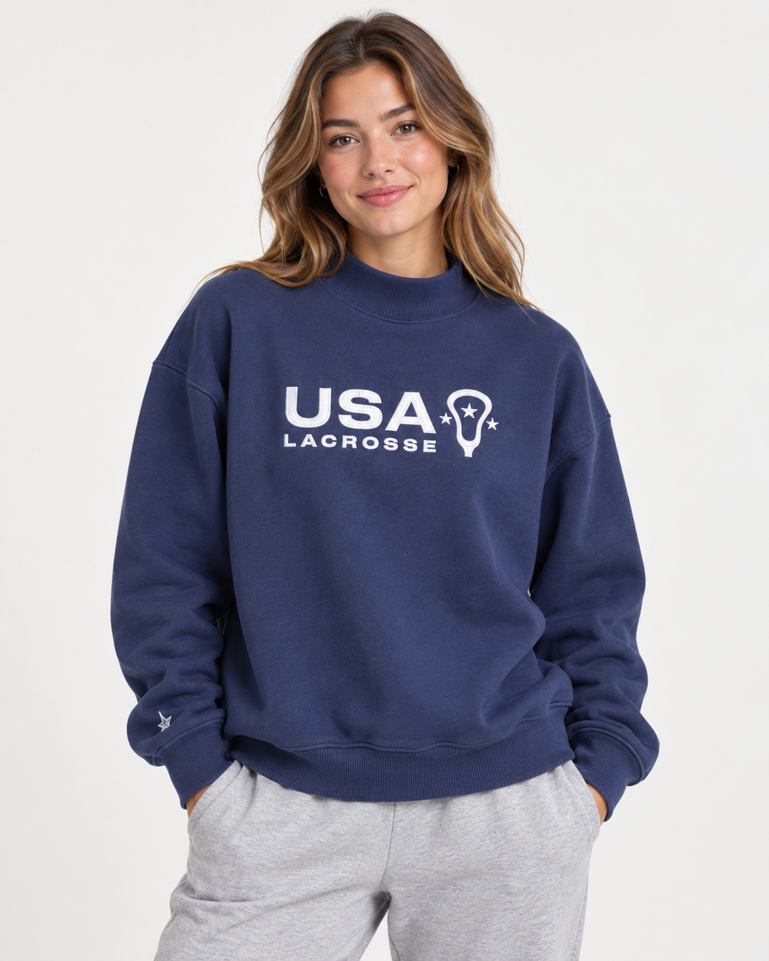 Front view of USALacrosse Mockneck Sweatshirt in blue on a model